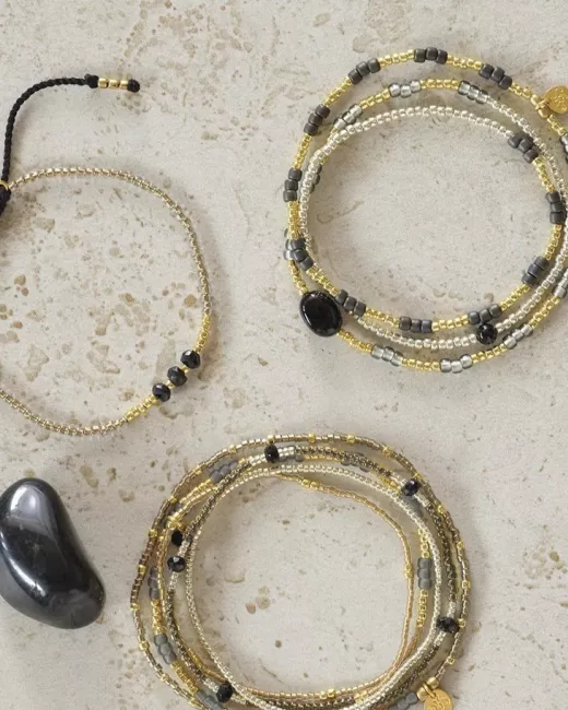 Feeling Zwarte Onyx Goudkleurige Armband