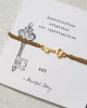 Symbol Key Gold bracelet