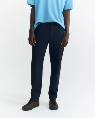 THINKING MU - Travel pants navy en coton bio